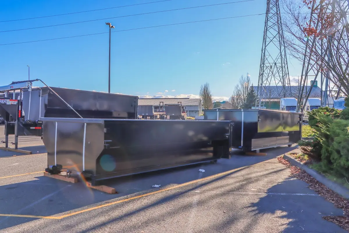 Roll-off dumpster ready for waste disposal at job site for Roofing Dumpster Rental in Calimesa